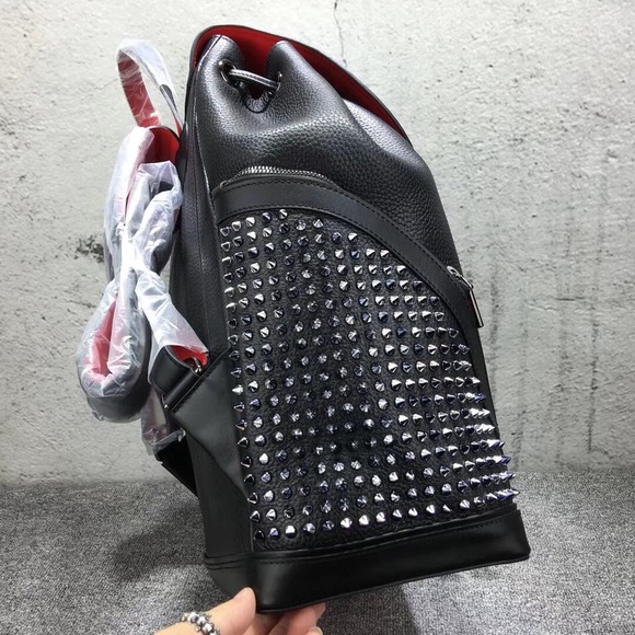 red bottom bookbag